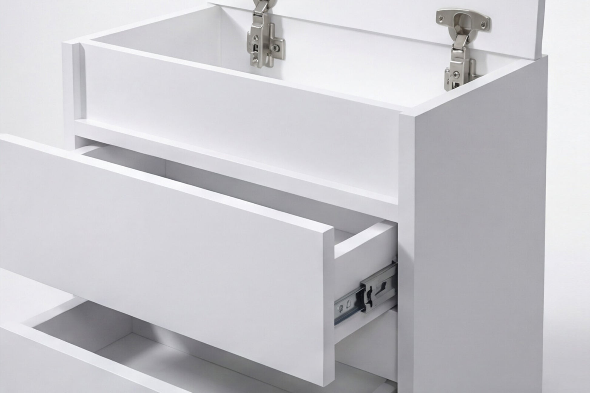 White cabinet with open drawer and visible hinges on a white background